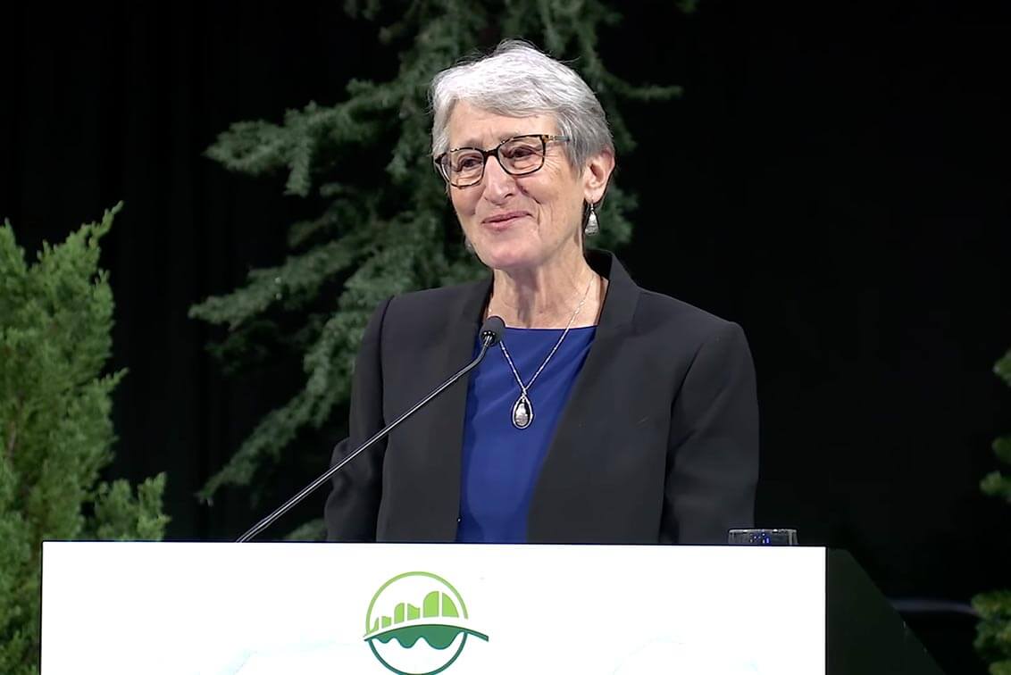 Triangle behind a mountain range made with structural grid like texture