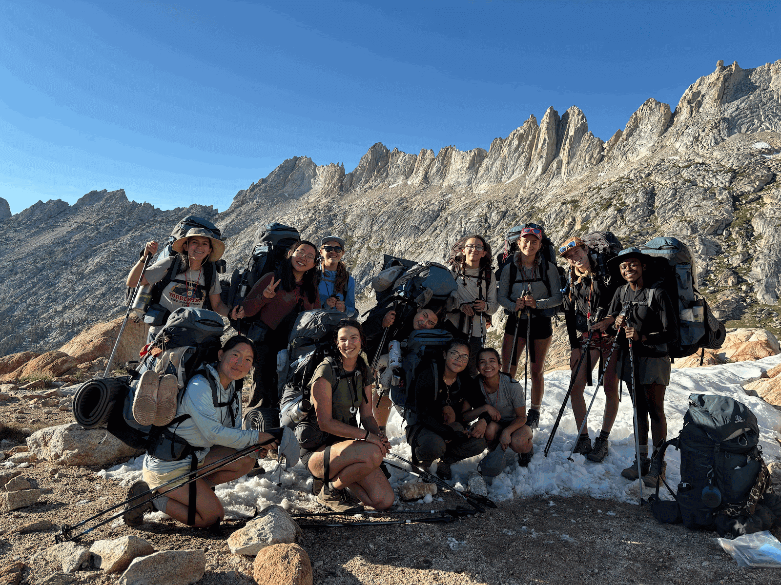 The Armstrong Scholars posing for a group photo at a mountain pass