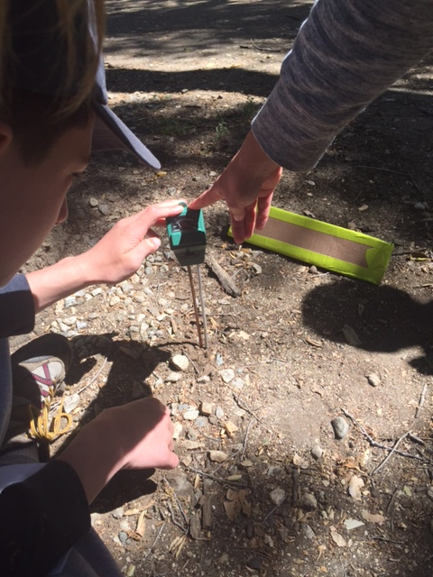 Students use science tools to test soil types