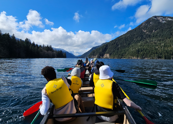 Students canoeing on Lake Crescent in Olympic