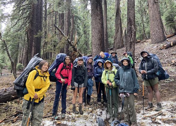 Armstrong Scholars pose for a photo on a hike. 