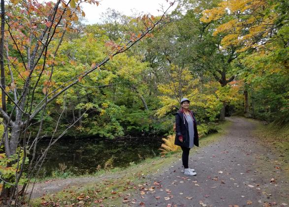 Audrey Galo exploring the fall foliage at Ōnuma Park in Hokkaidō, Japan.