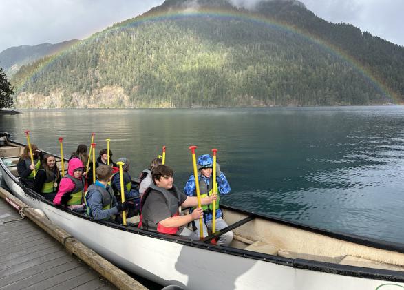 Students canoeing on Lake Crescent in Olympic