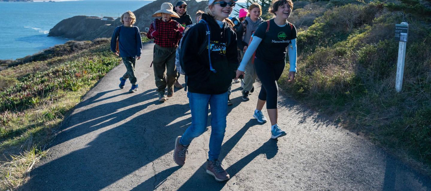 Students walking along a path in Golden Gate Recreational Area