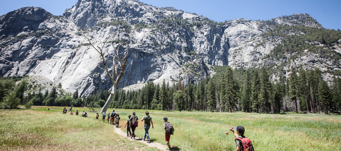 Students and families enjoying a hike in Yosemite Valley