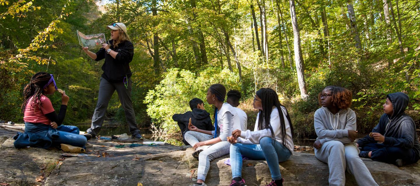 A NatureBridg educator teachers her students in Prince William Forest