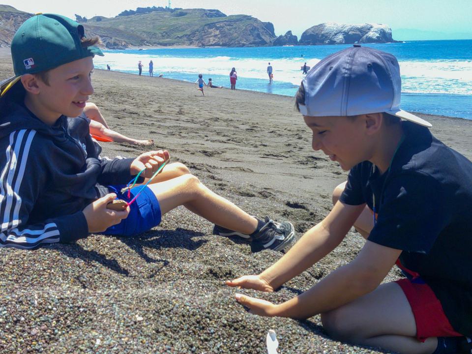 Coastal Camp students playing on the beach