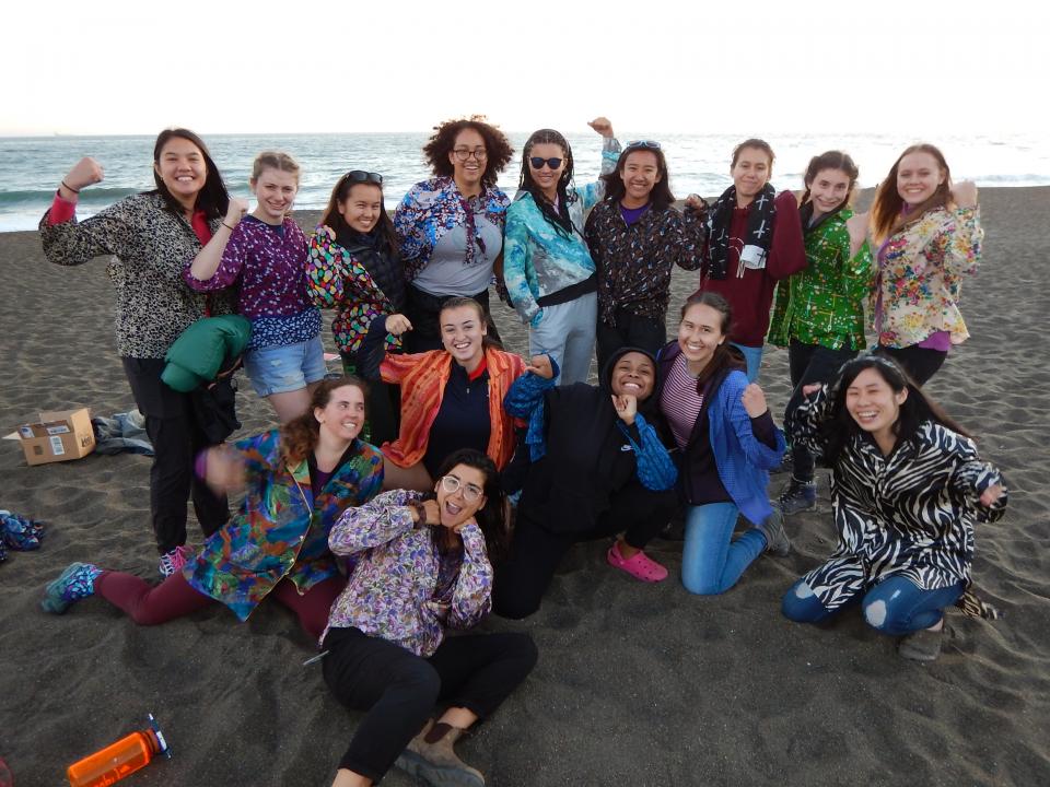 the 2019 scholars posing for a photo on the beach