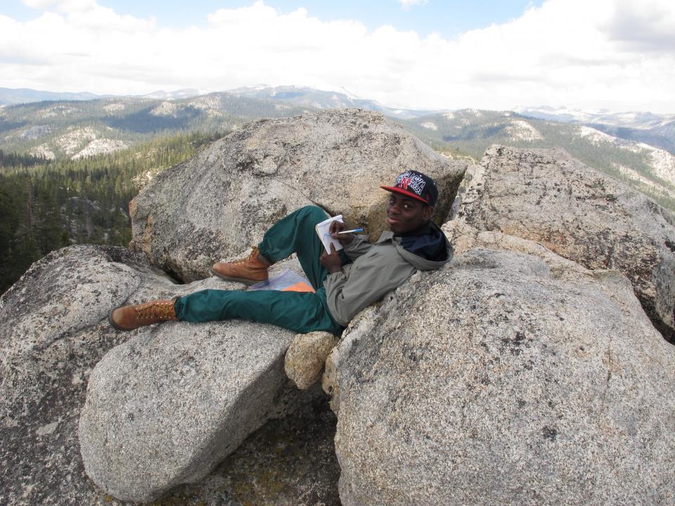 Student journaling in Yosemite National Park at a WildLink program