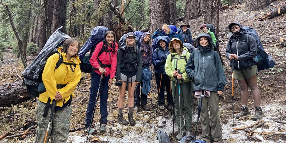 Armstrong Scholars pose for a photo on a hike. 
