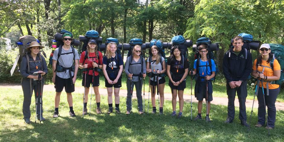 The Alcoa Scholars posing with their backpacking equipment.