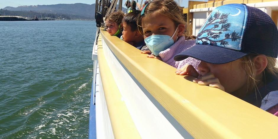 Coastal Camp students on a boat on the open water